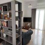 1747055172796 - Ulysses Apartments Living room with sofa bed